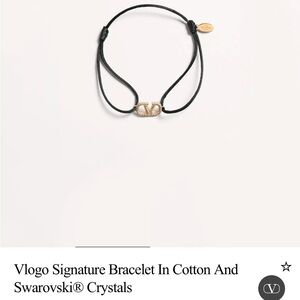 Brand new in box Valentino Garavani Black and Gold Vlogo Bracelet